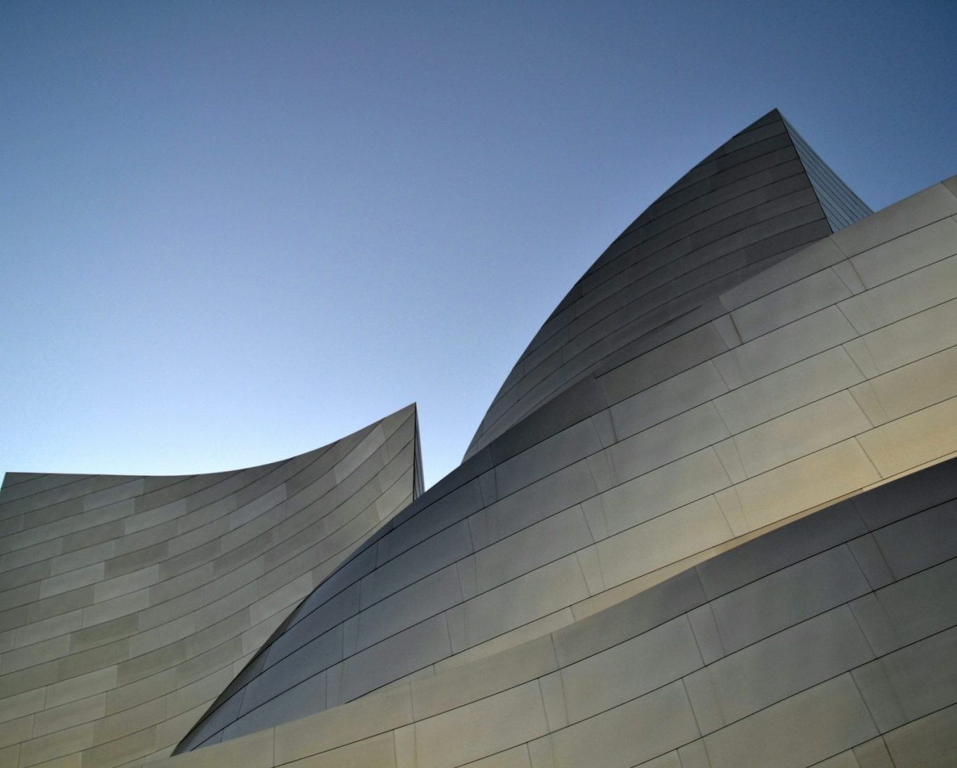 Modern building representing quick links and legal support resources for Vista Community Clinic patients