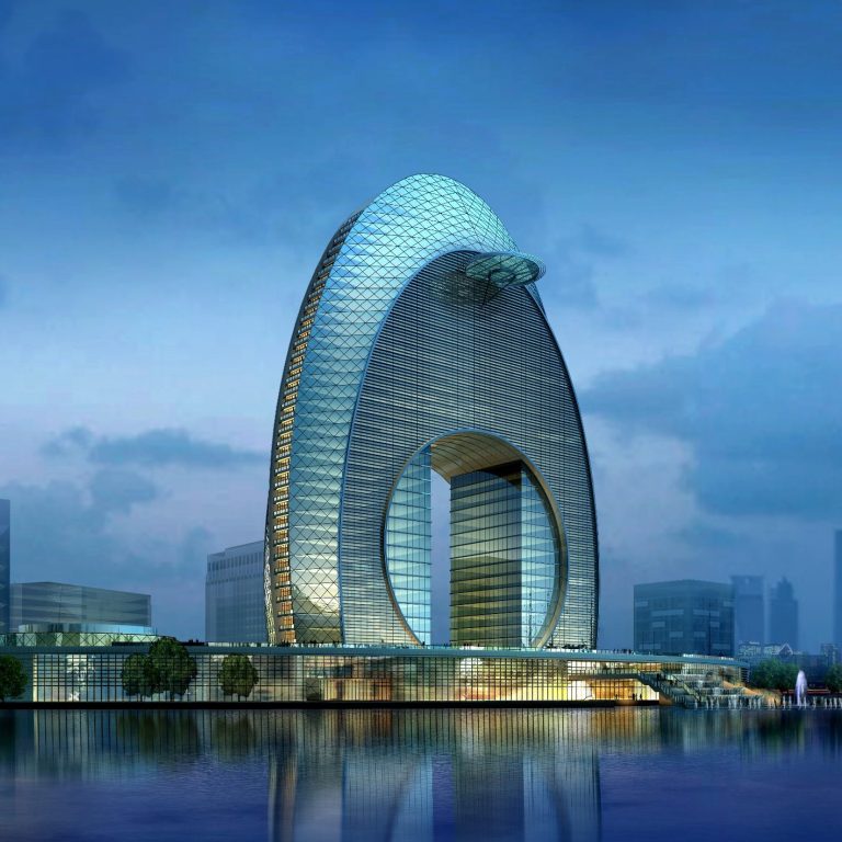 Modern building at night representing higher-level grievance oversight for VCC