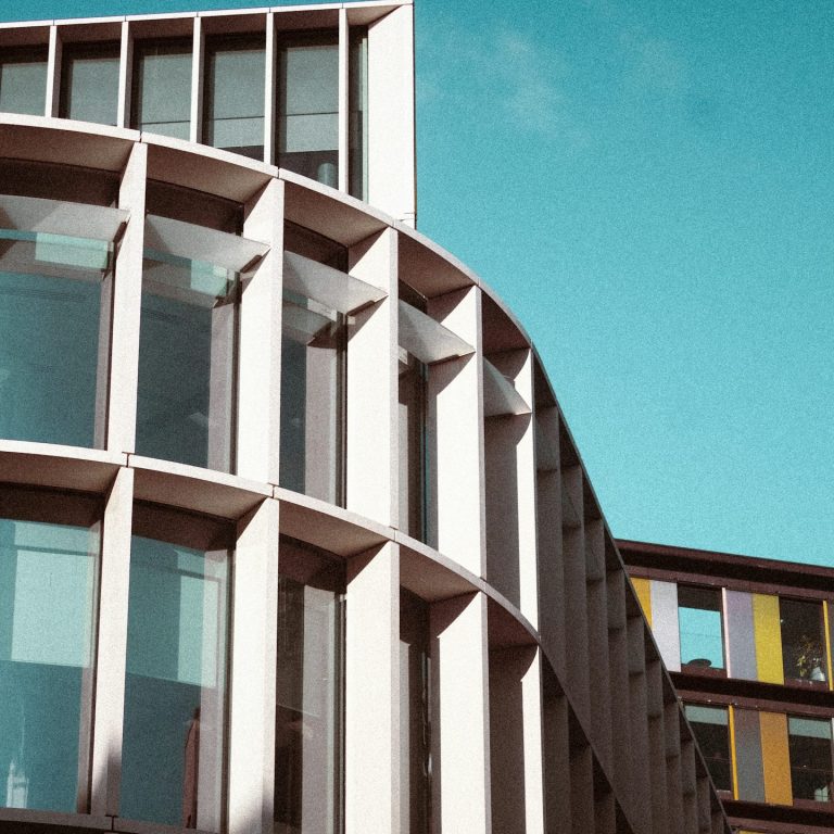 Exterior view of Vista Community Clinic’s main building featuring modern glass and concrete design