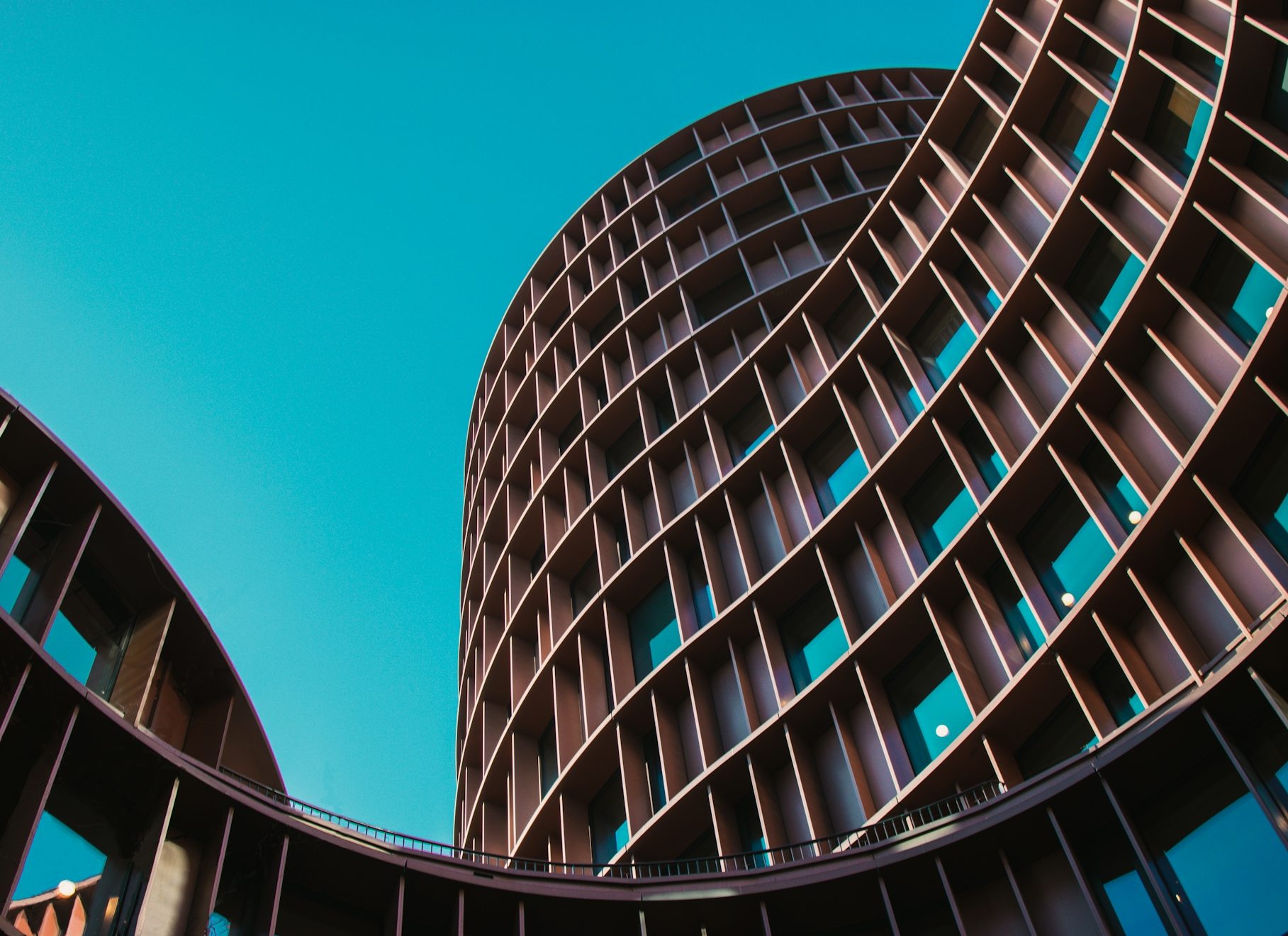 Curved architecture symbolizing multiple Vista Community Clinic locations and facility access across California