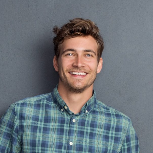 Smiling man representing the mastermind webmaster behind the Vista Community Clinic legal protest site.